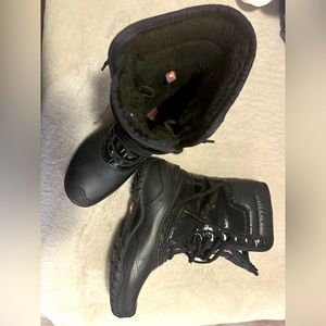 Northface woman waterproof boots size 7.5
